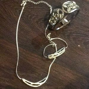 Necklace earrings and two bracelets